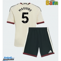 Manchester United Harry Maguire #5 Tredjedraktsett Barn 2026-27 Kortermet (+ Korte bukser)